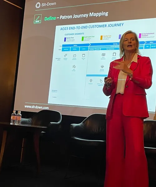 KC presenting at a CX event